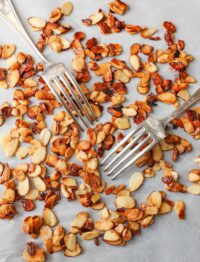 Caramelized Almonds on parchment with forks