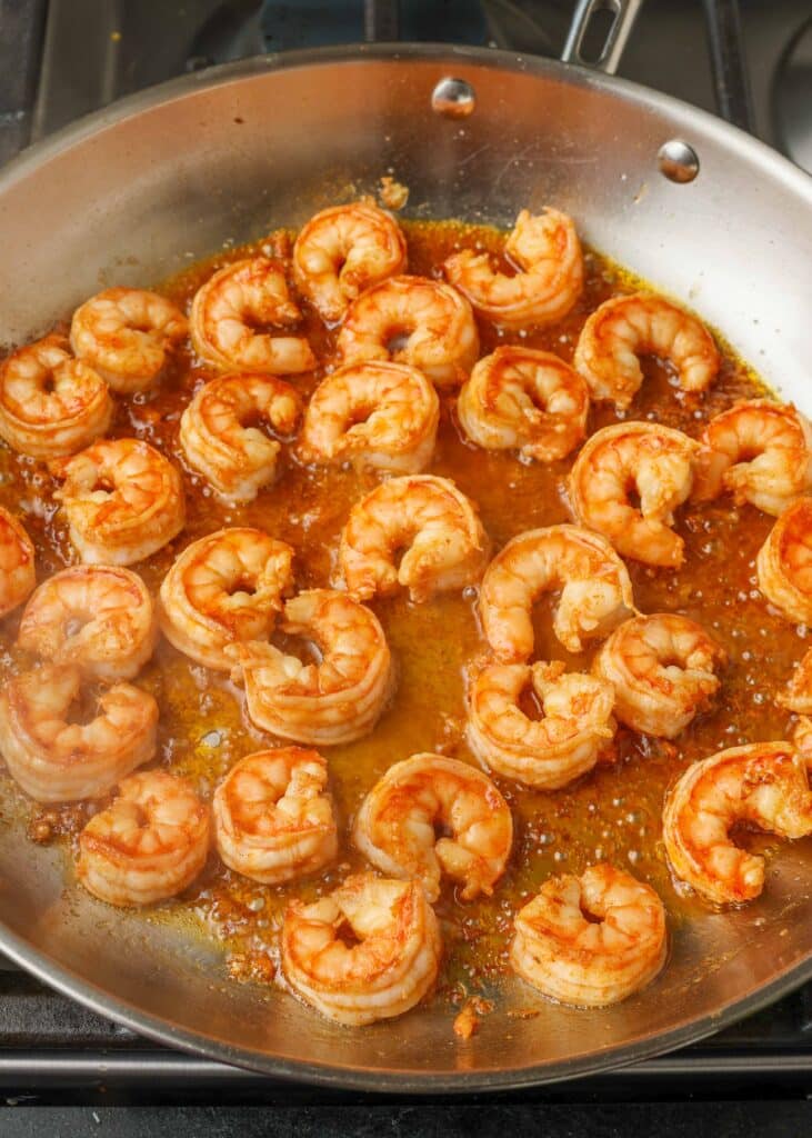 cooked shrimp with garlic lime sauce in pan