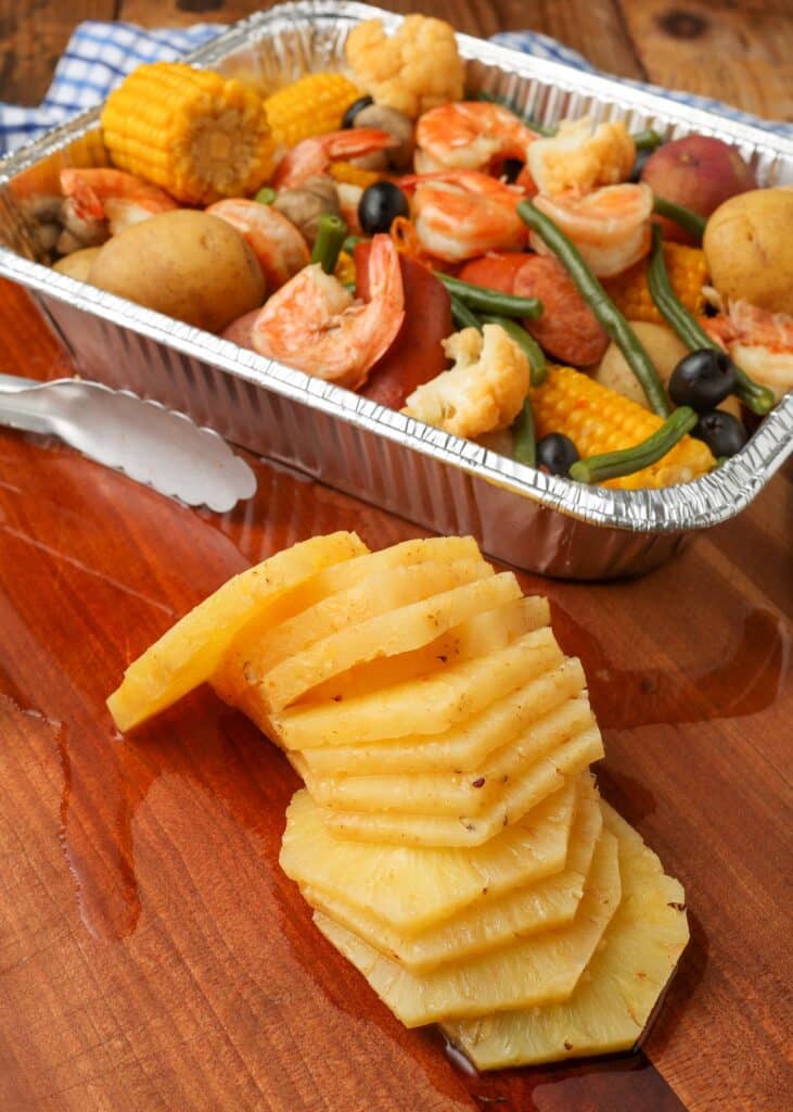Sliced pineapple and shrimp and mixed vegetables