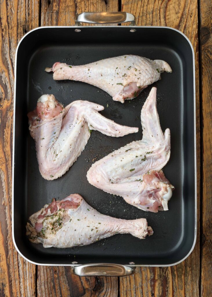 turkey wings and legs in pan