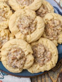 Walnut cookies on plate with a flowered napkin
